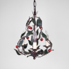 Chandelier with cherries from France. This metal chandelier with little cherries and green leaves is made in France in the 1950s.