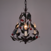 Chandelier with cherries from France. This metal chandelier with little cherries and green leaves is made in France in the 1950s.