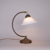 Art deco bow table lamp with white opaline lampshade