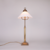 Art deco table lamp with white opaline lampshade and a square lamp base from France made in the 1930s.